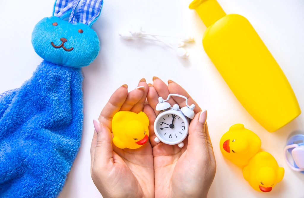 Baby bathing accessories on a white background. Selective focus.